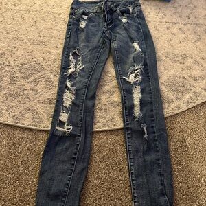 Distressed Blue Jeans